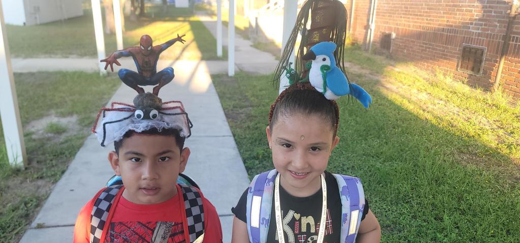 Students posing with crazy hair