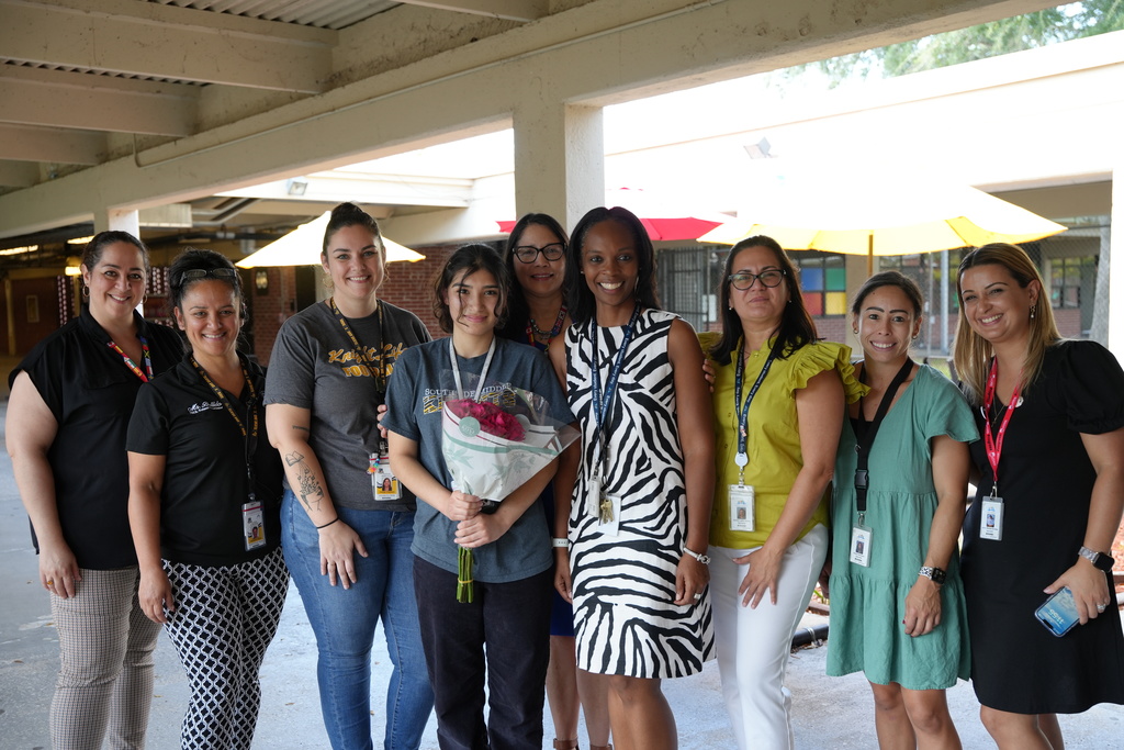Tania from Southside Middle School stands proudly while being recognized for her powerful Hispanic Heritage Essay.