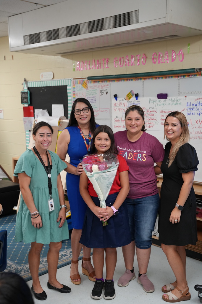 Nathalie, a student at Beauclerc Elementary, smiles as she is honored for her award-winning Hispanic Heritage Essay