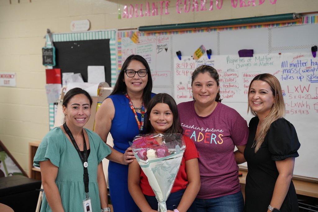 Nathalie, a student at Beauclerc Elementary, smiles as she is honored for her award-winning Hispanic Heritage Essay