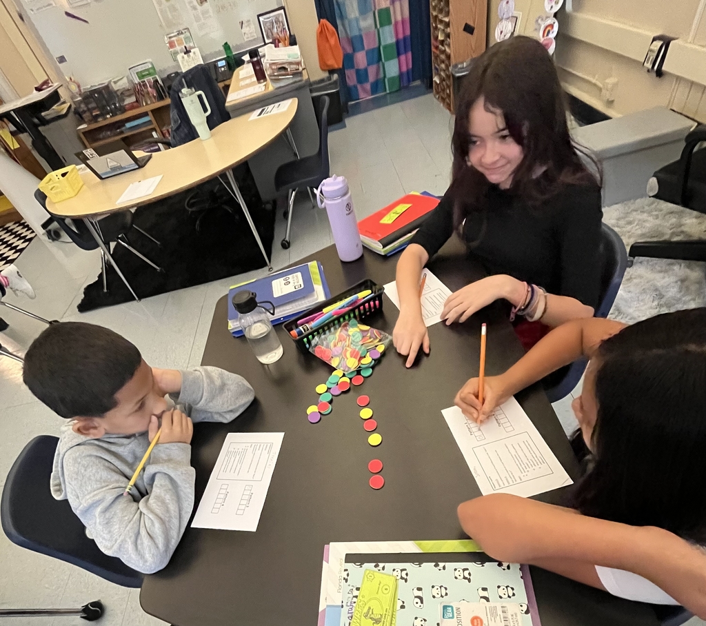 three students working together