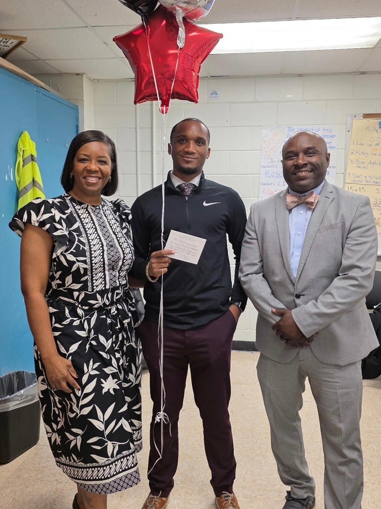 Photo of AP Knight, Mr. Floyd, and Principal Mungin celebrating Mr. Floyd begin named 2025-2026 Teacher of the Year for the Leadership Academy