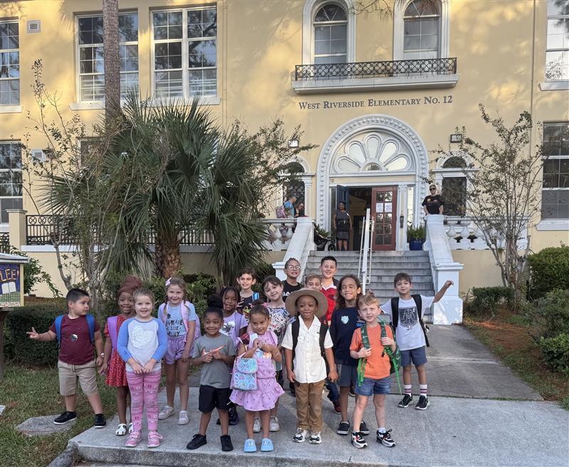 Students in front of the school