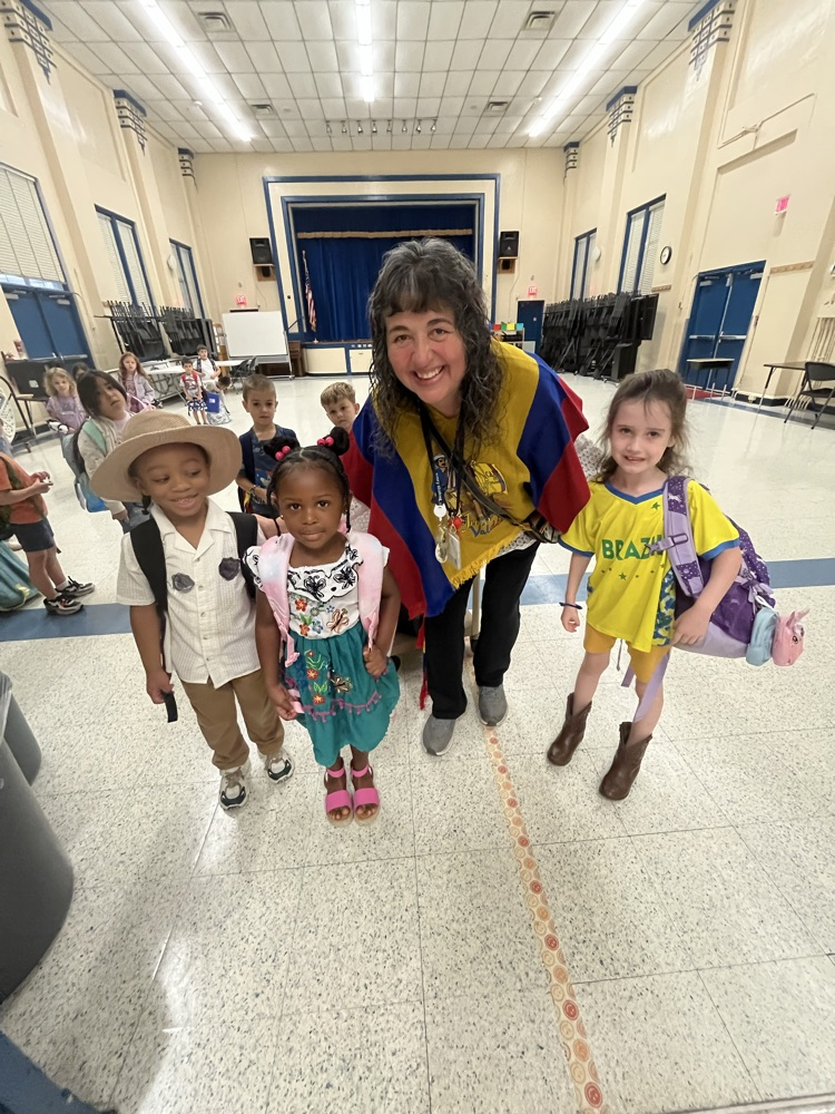 kindergarten teacher with her students
