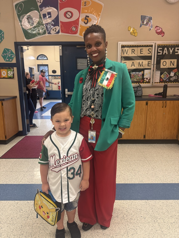 VPK teacher in student and their flag colors