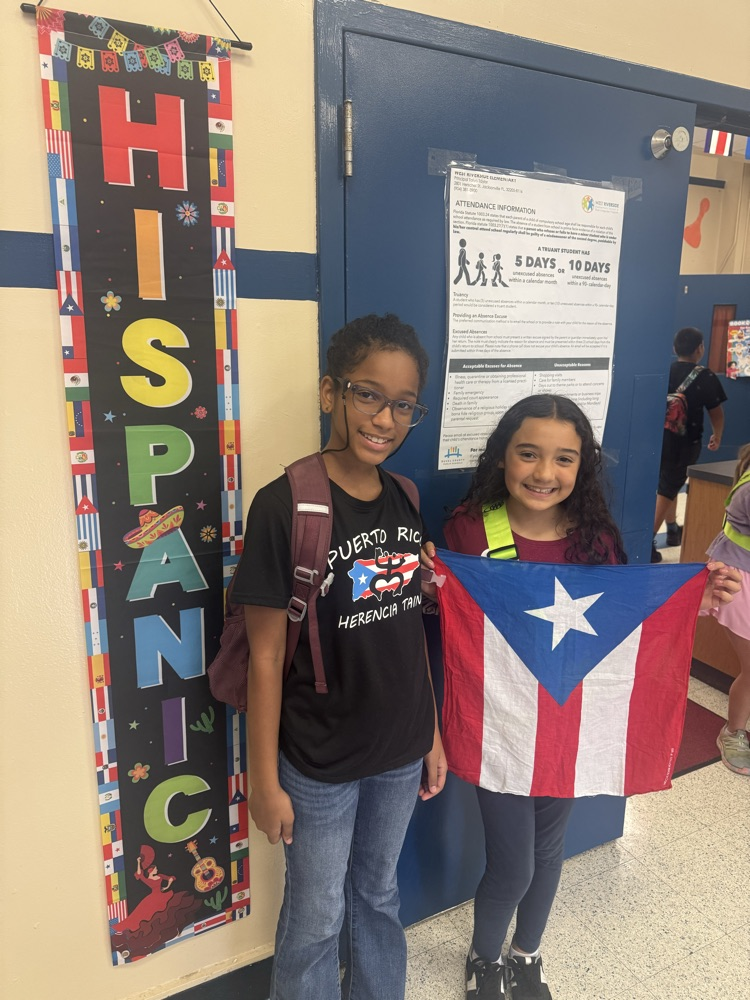fifth grade students with their Hispanic flag