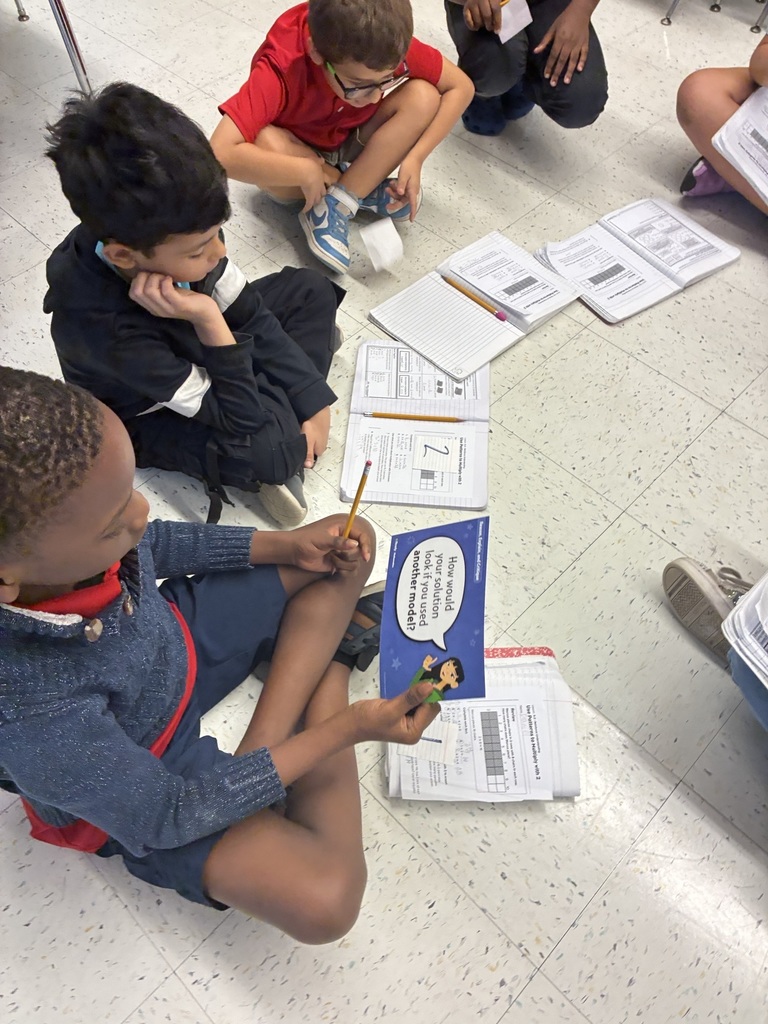 Student reading question for group discussion