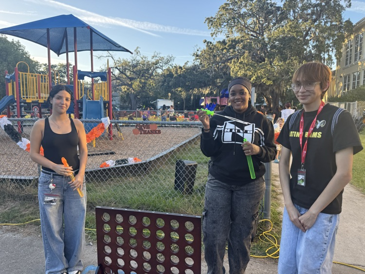 volunteers blowing bubbles