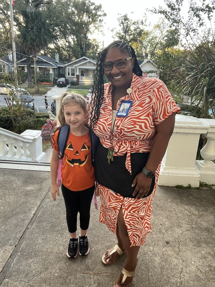 student wearing orange