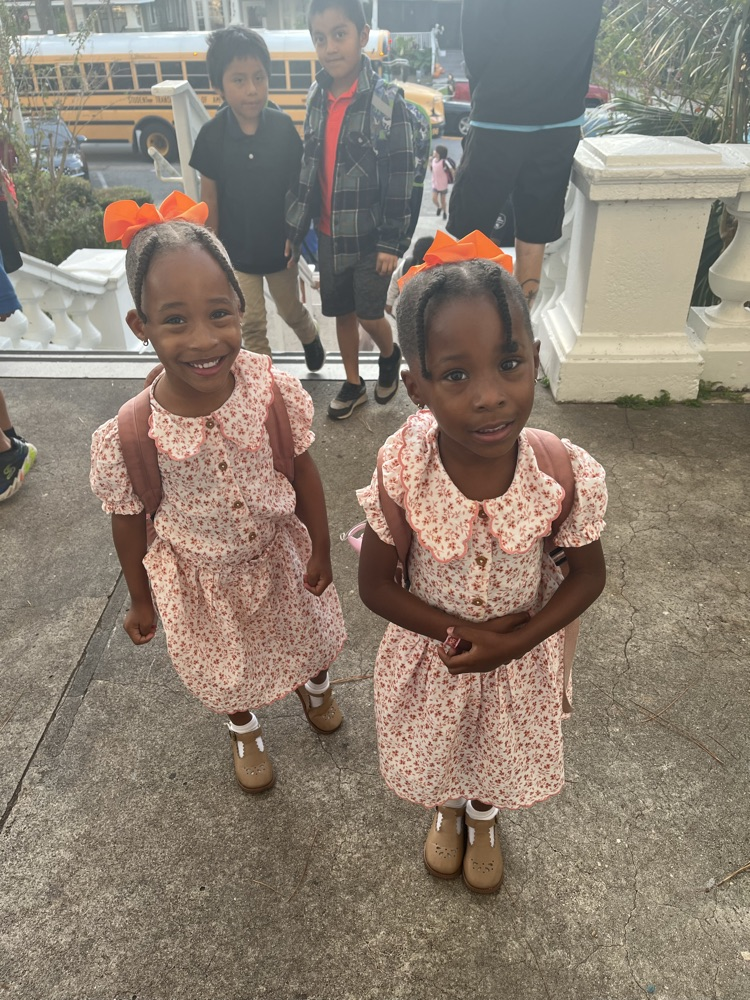 student wearing orange