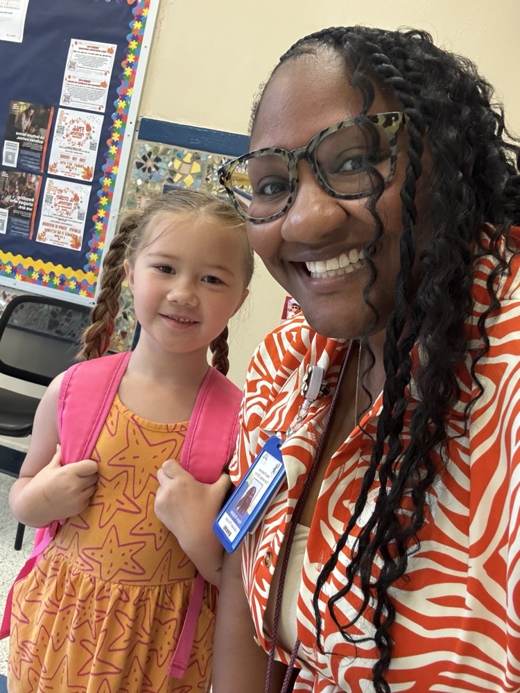student wearing orange