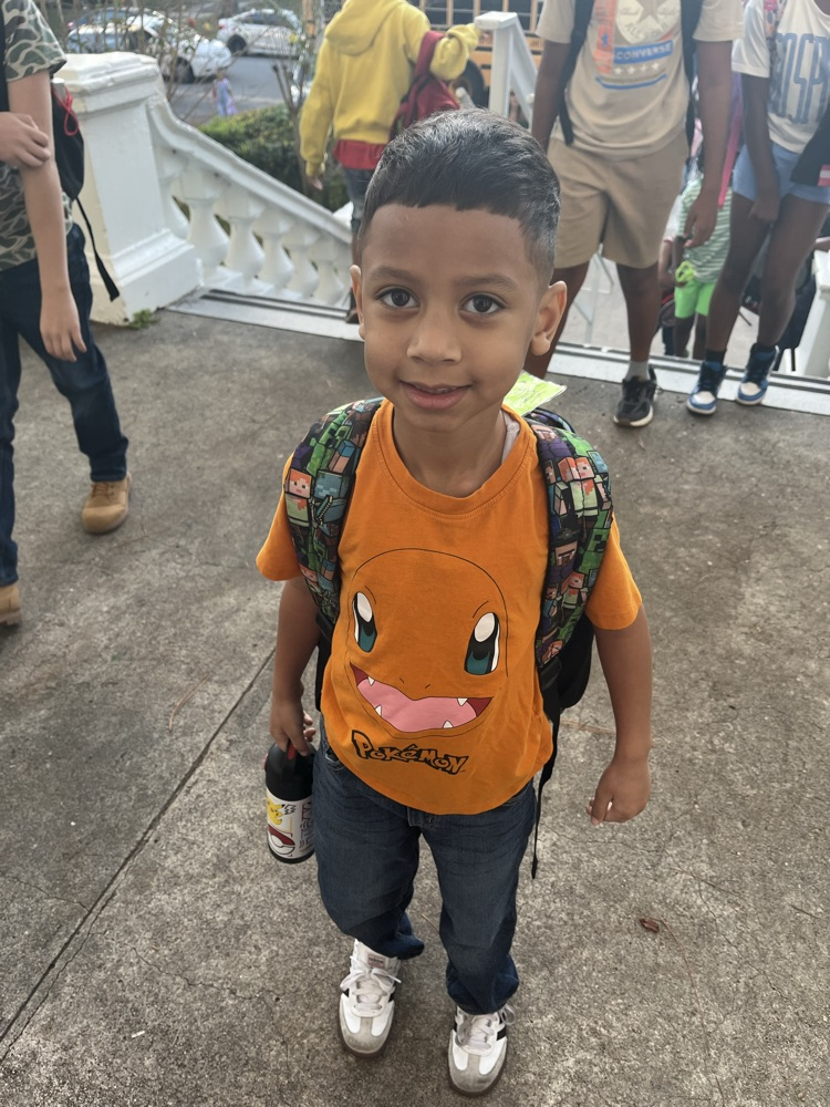 student wearing orange