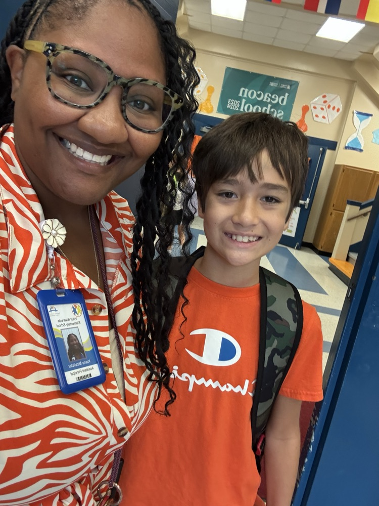 student wearing orange