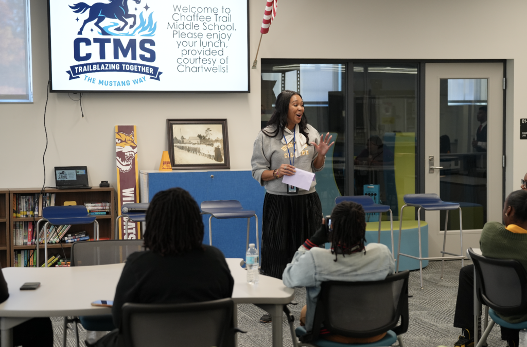Bethune-Cookman University students seated together, listening to speakers during the visit.