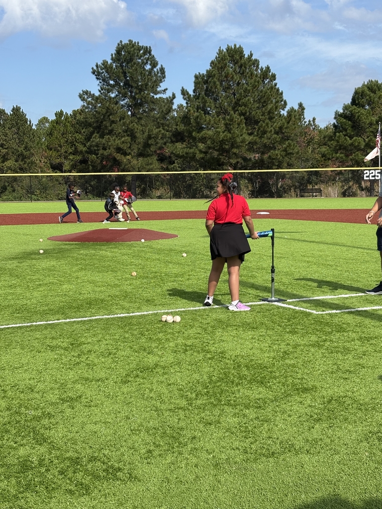 Child hitting from tee