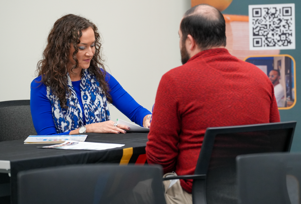 A candidate meets with a DCPS recruiter during the Retired Educators Hiring Fair.