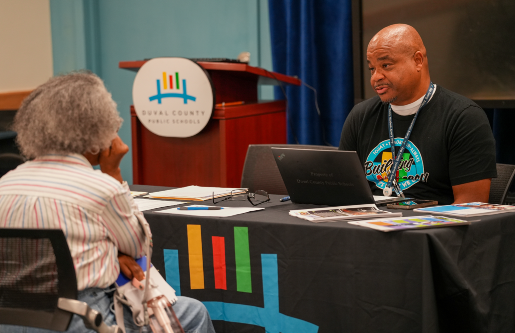 A candidate meets with a DCPS recruiter during the Retired Educators Hiring Fair.