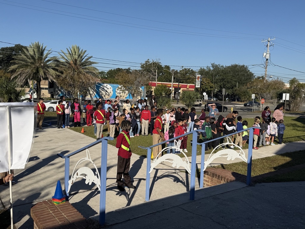 People gathered outside of school