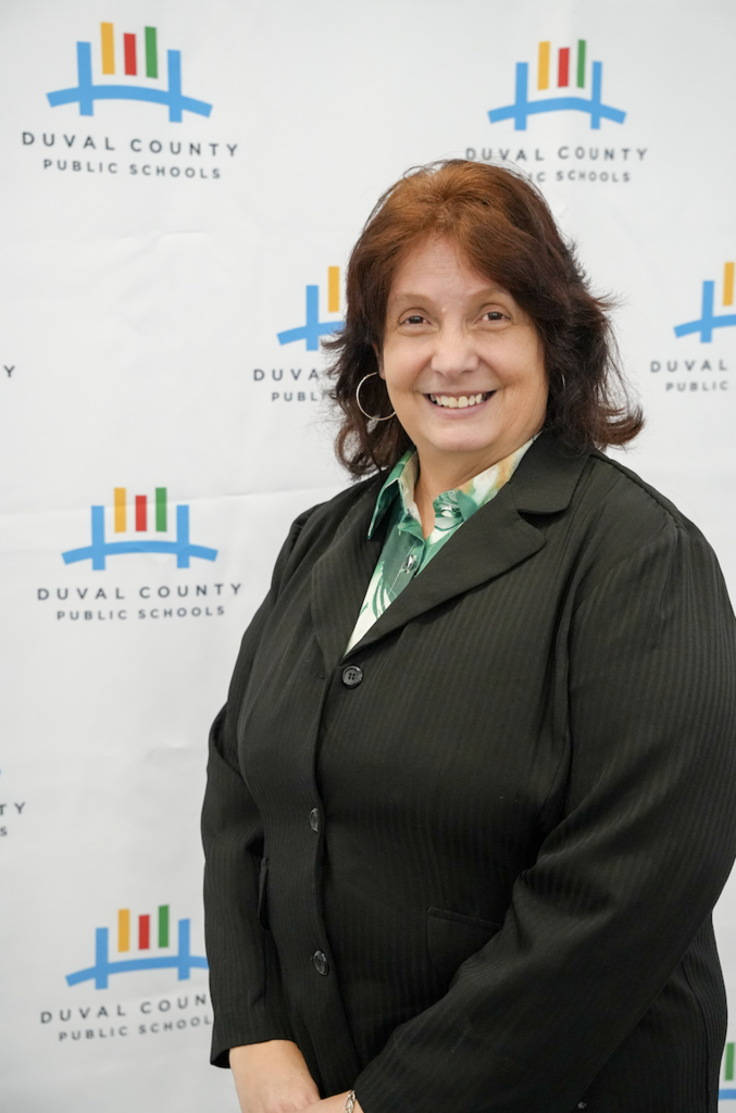 Job Fair at Schultz Center with new hires taking photos.