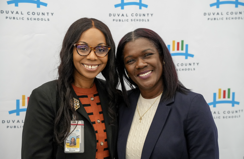 Job Fair at Schultz Center with new hires taking photos.