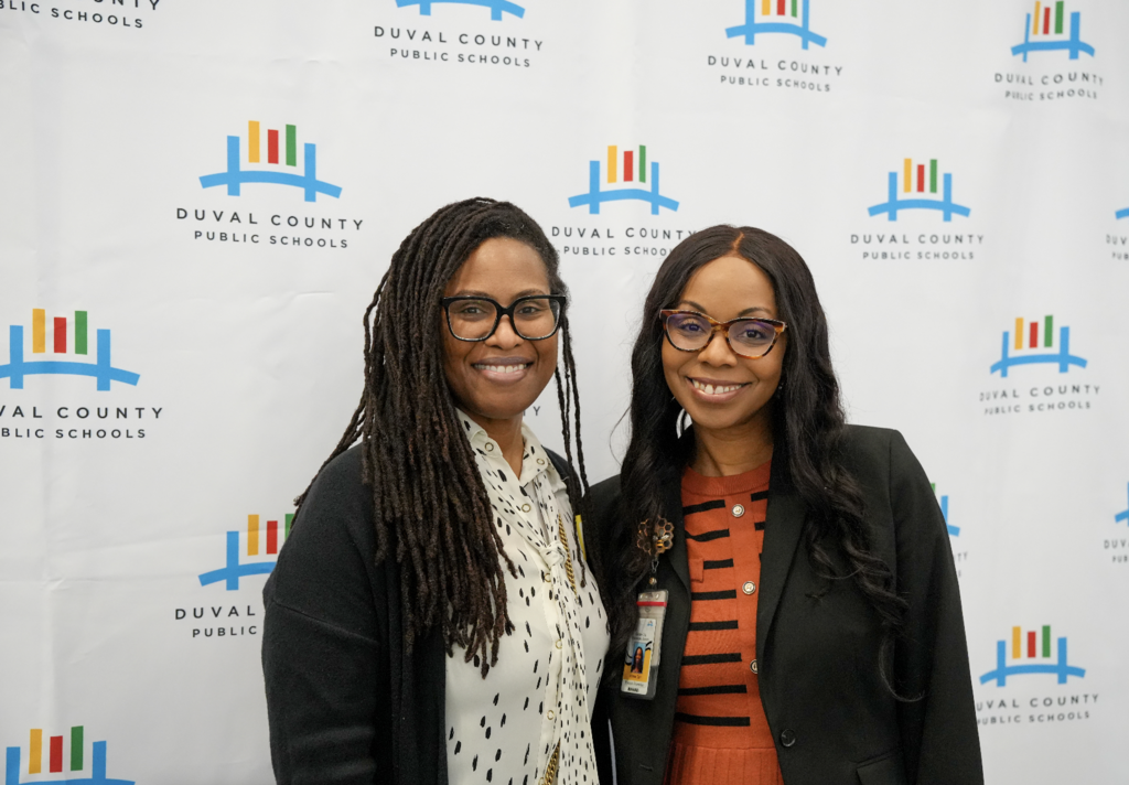 Job Fair at Schultz Center with new hires taking photos.