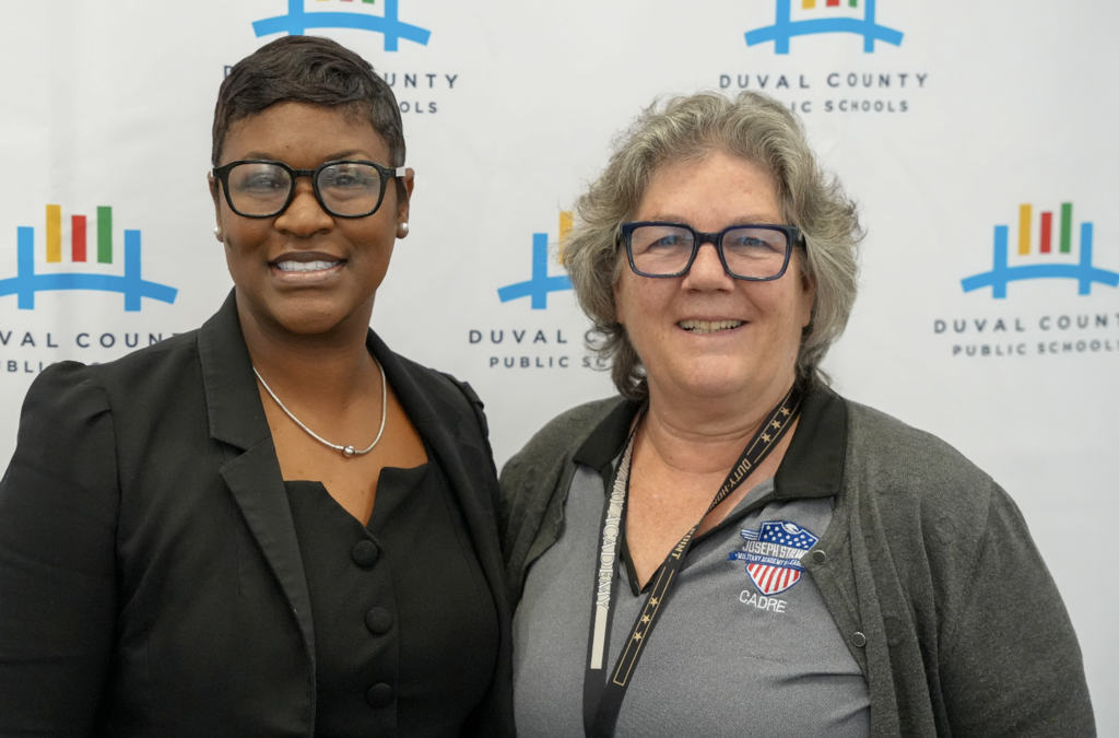 Job Fair at Schultz Center with new hires taking photos.