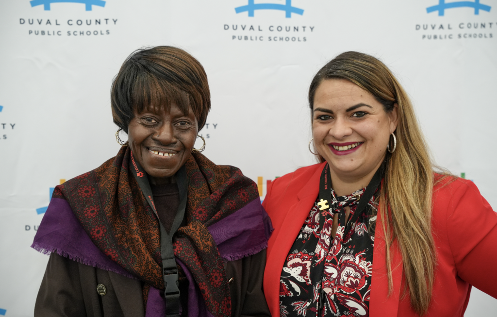 Job Fair at Schultz Center with new hires taking photos.
