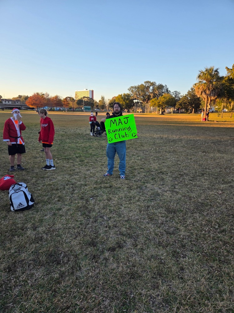 MAJ run club members gather at Run Santa Run event