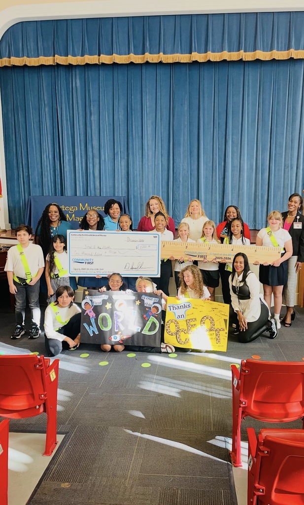 Safety Patrol accepting check