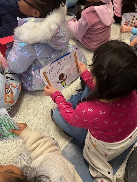 A student with a peaceful protest sign 