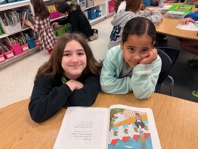 K/5th book buddies reading together