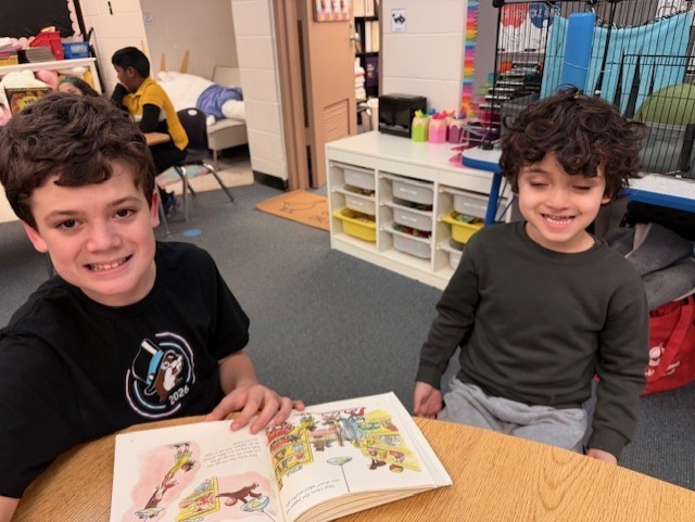K/5th book buddies reading together