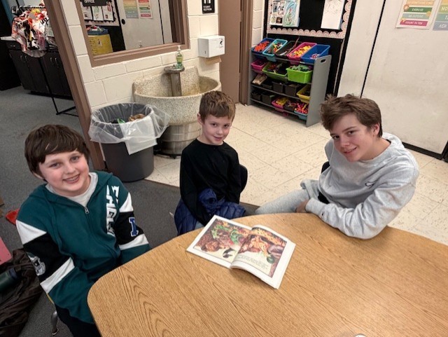 K/5th book buddies reading together