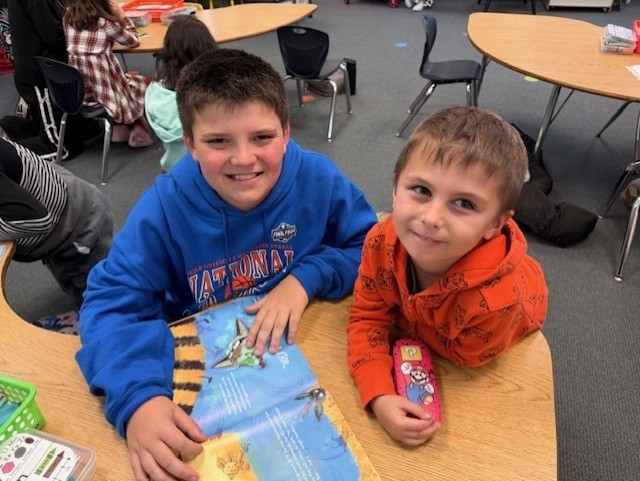 K/5th book buddies reading together