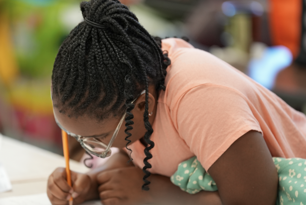 A student works quietly at a desk in Elizabeth Dent’s classroom.