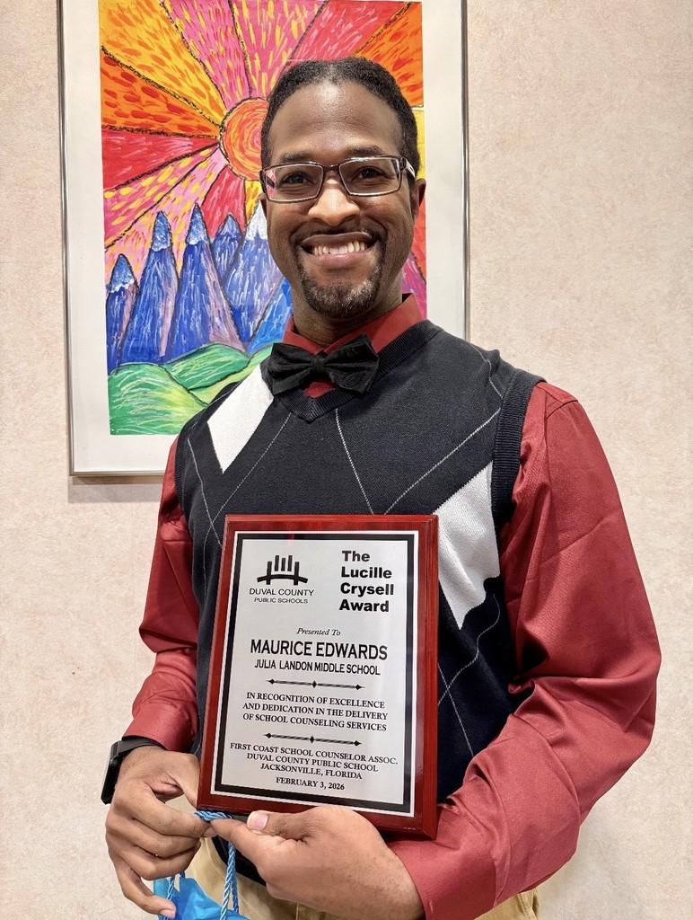 Mr. Edwards, our School Counselor winning the Lucille Crysell Award