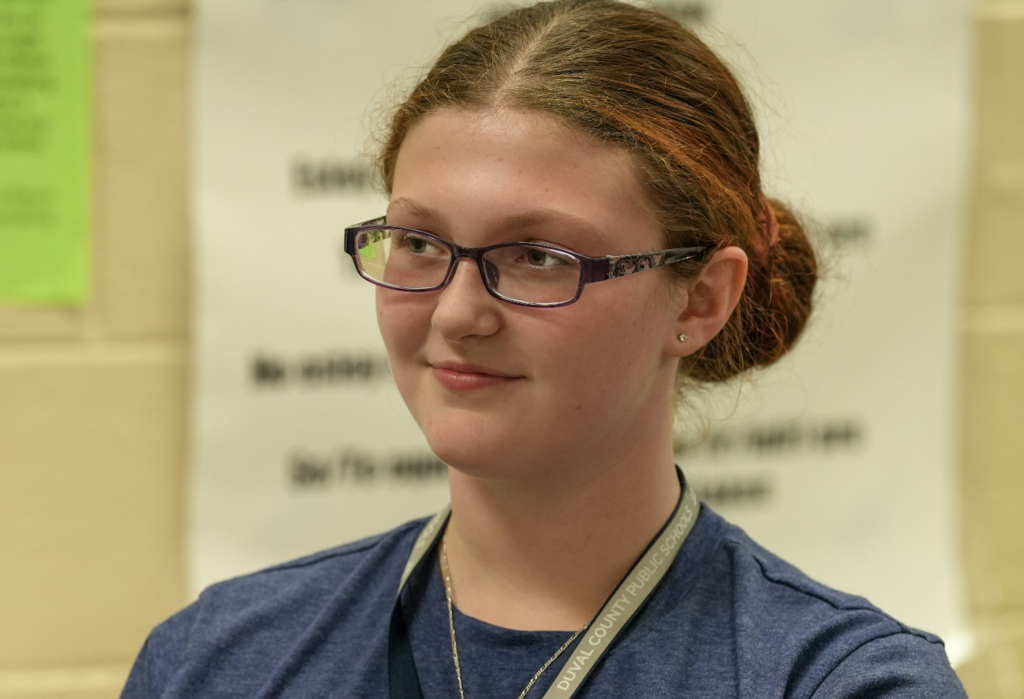 Student smiling while listening during Spanish class at Paxon High School.