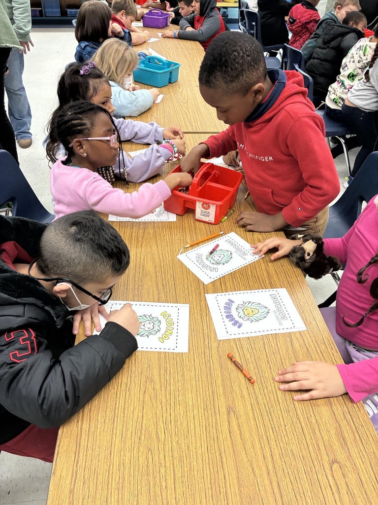 students working on hallway display