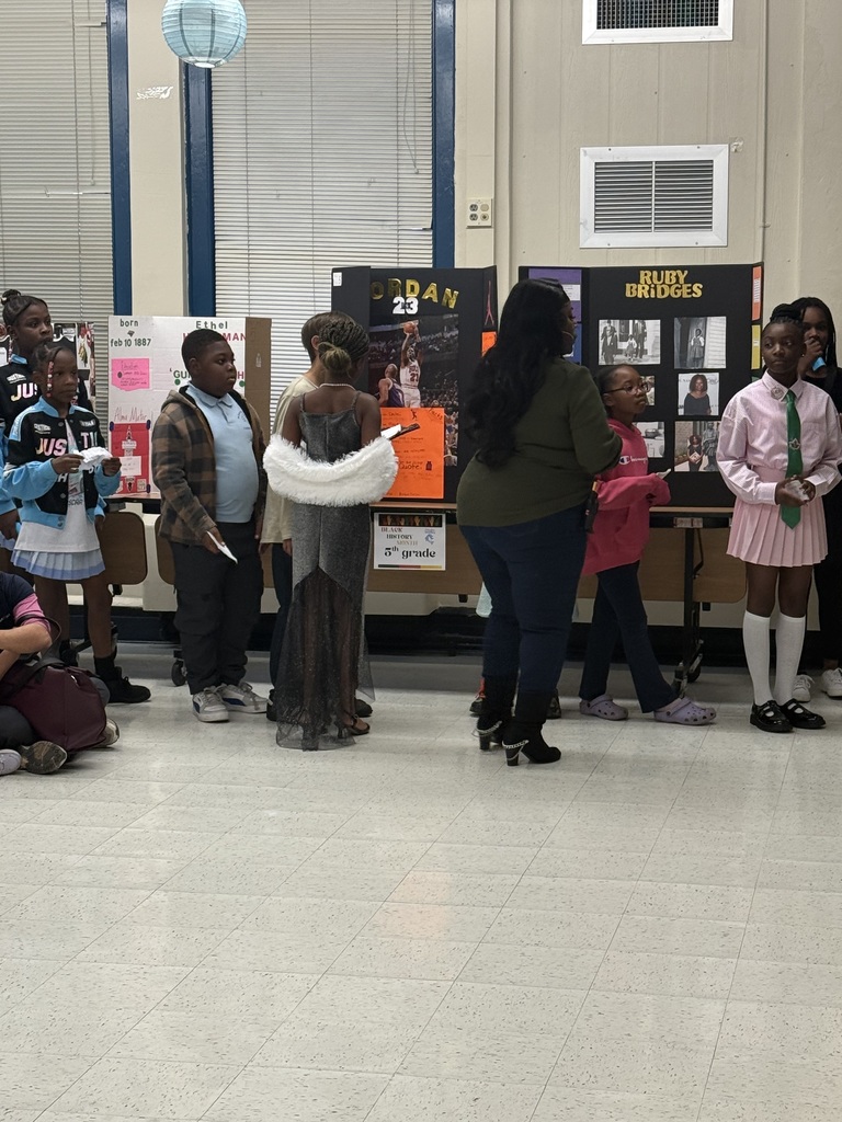 students looking at projects