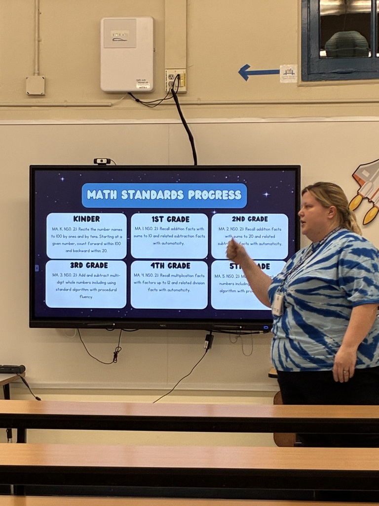 assistant principal talking to group