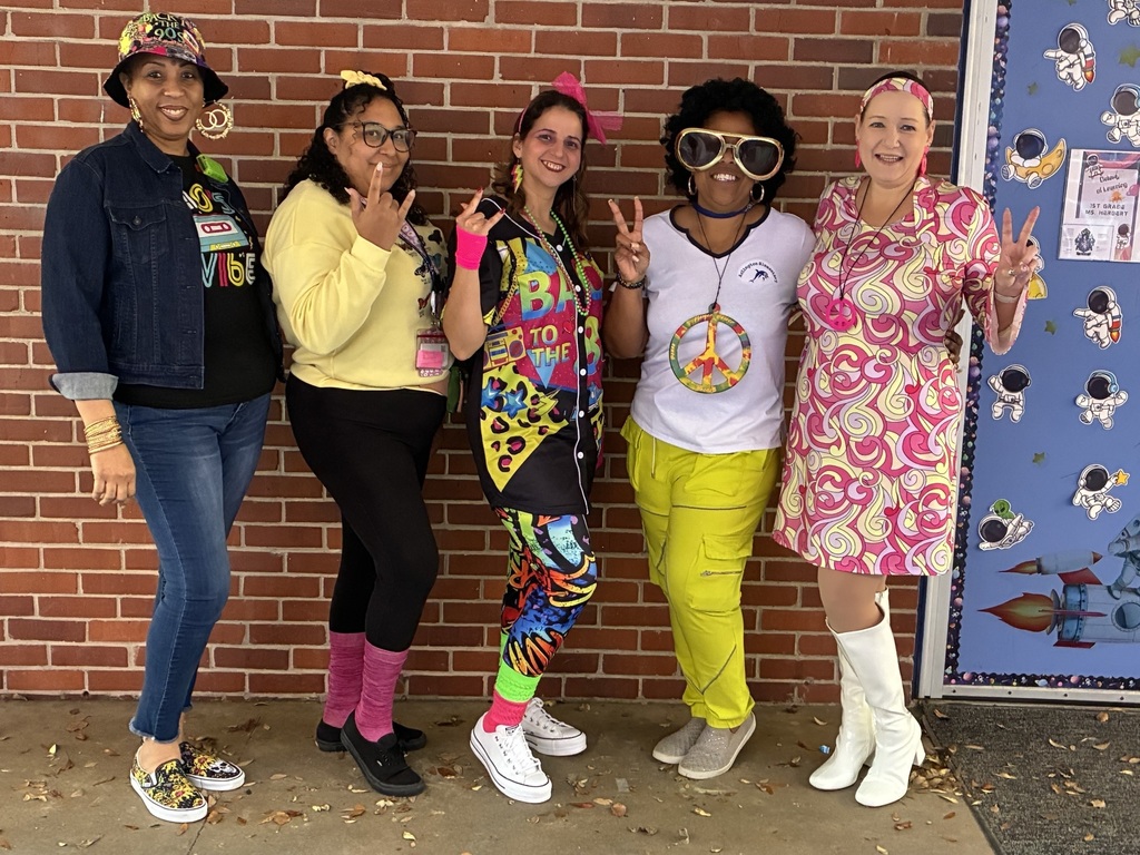 staff dressed up for decades day