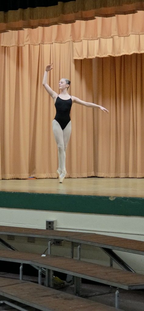 A ballerina on point shoes