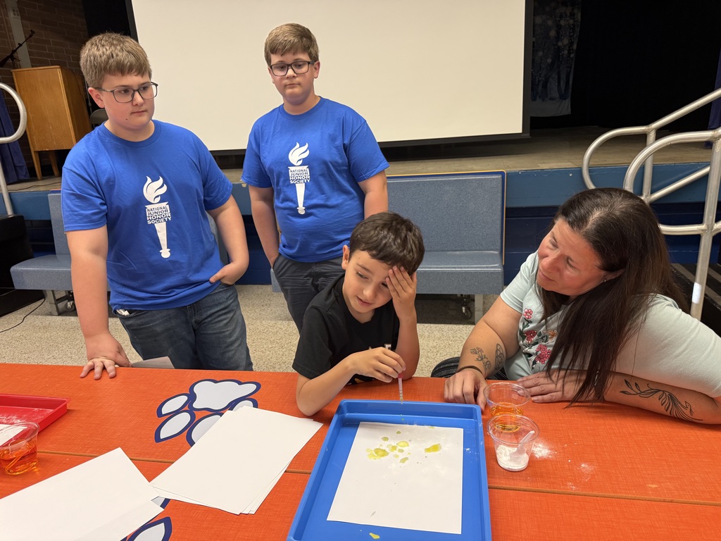 Creating moon crates with support from Oceanway Middle School students.