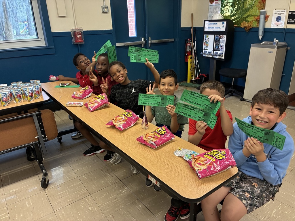 students with snacks and dance tickets