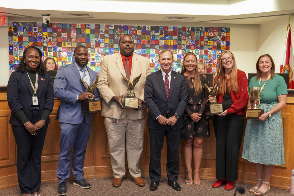 Winners of countywide student voter registration drive and Jerry Holland