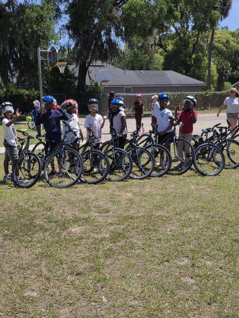 Students next to bikes
