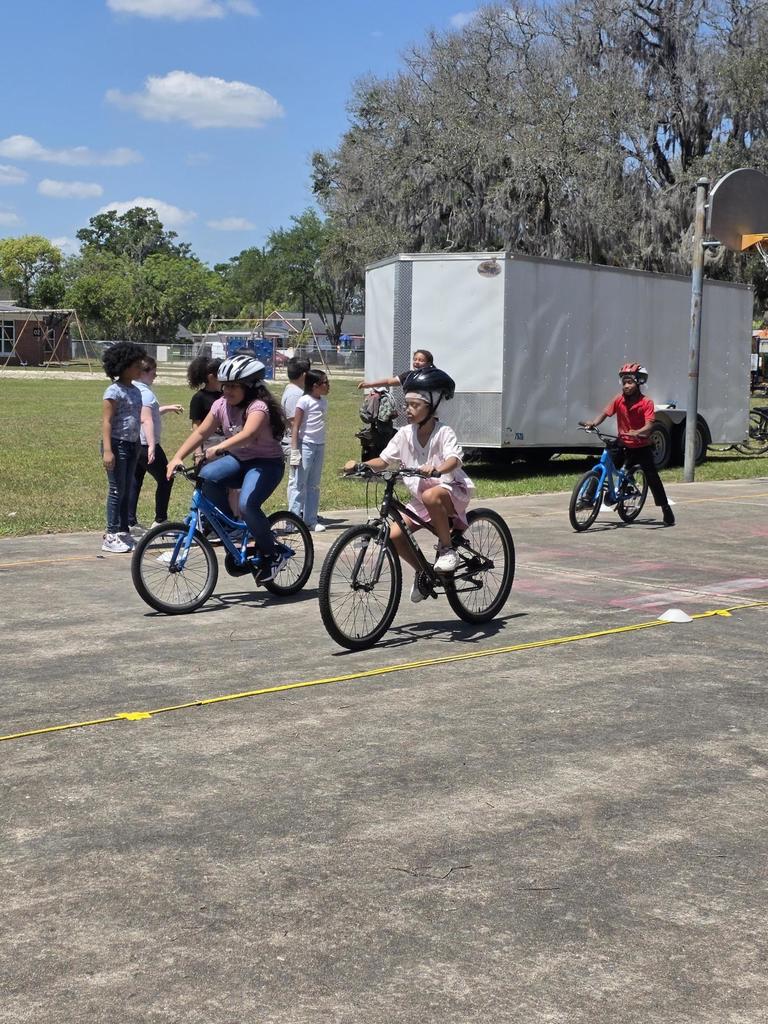 Students riding bikes