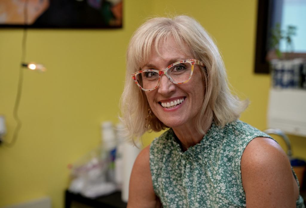 Lyndzee McClure smiling in classroom