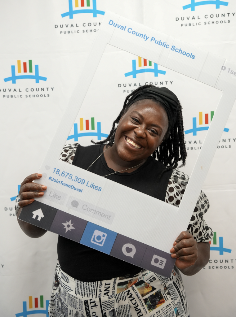 Individual attendee smiling at the Duval County Public Schools hiring fair
