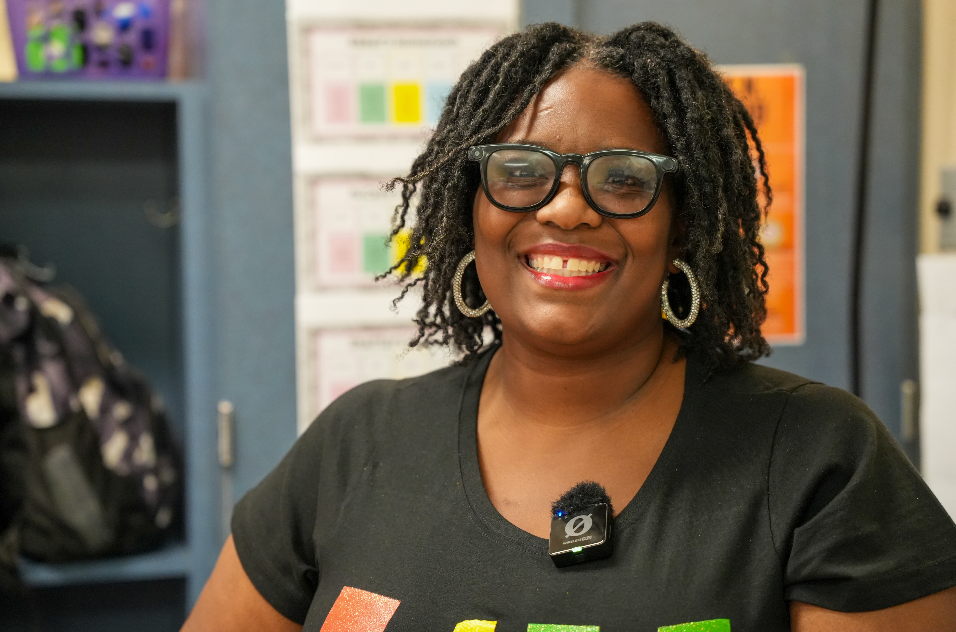 Rachquel Baker smiling in classroom